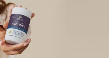 active peptides magnesium capsules on a tan background