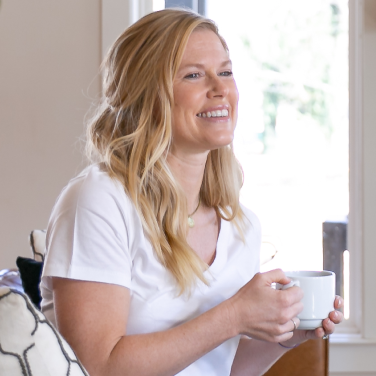 woman with white coffee cup