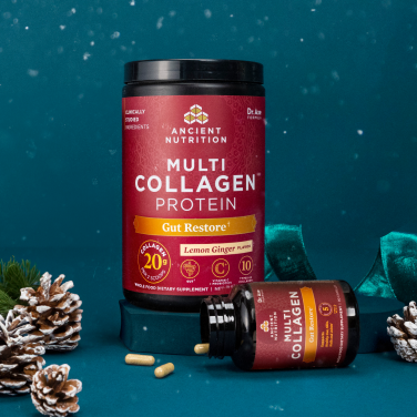 Multi Collagen Powder and Capsules Gut Restore on a dark blue background with pinecones