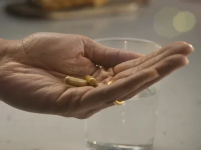 capsules in palm of hand