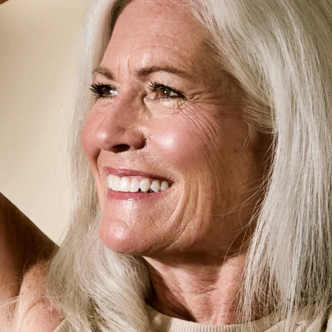 a woman with white hair