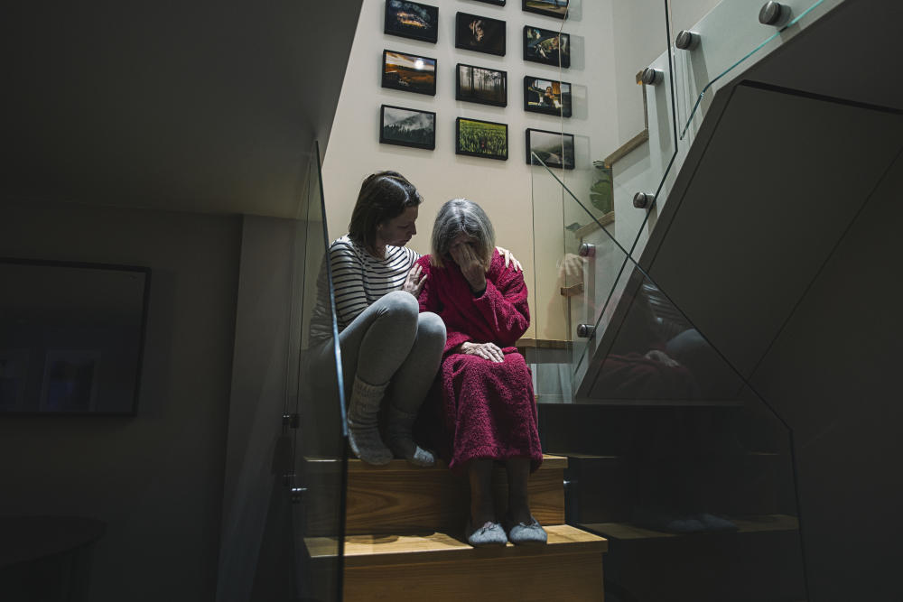 Mother and daughter on stairs