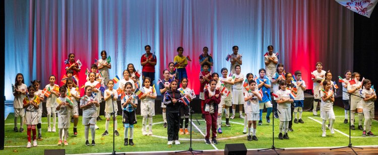 QF students present musical production inspired by World Cup