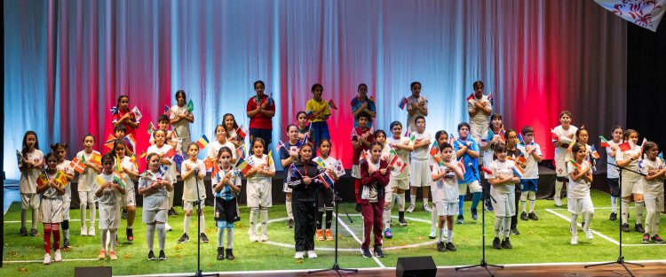 QF students present musical production inspired by World Cup