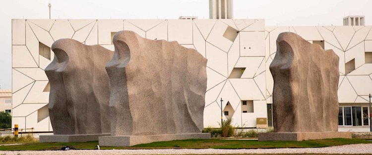 Walking through a storm, the Al Azzm sculpture brings out the essence of strength of women