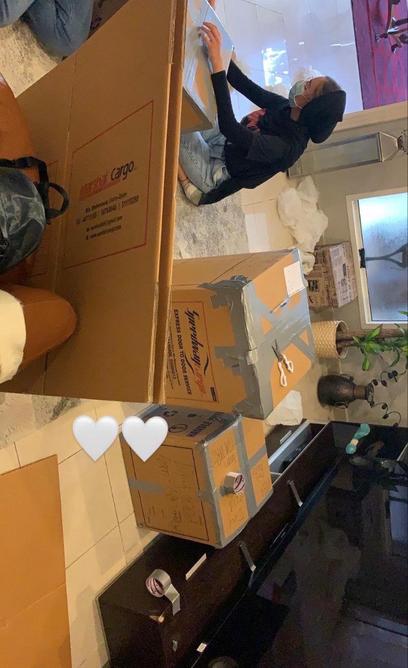 Image 4 QF students preparing donation boxes