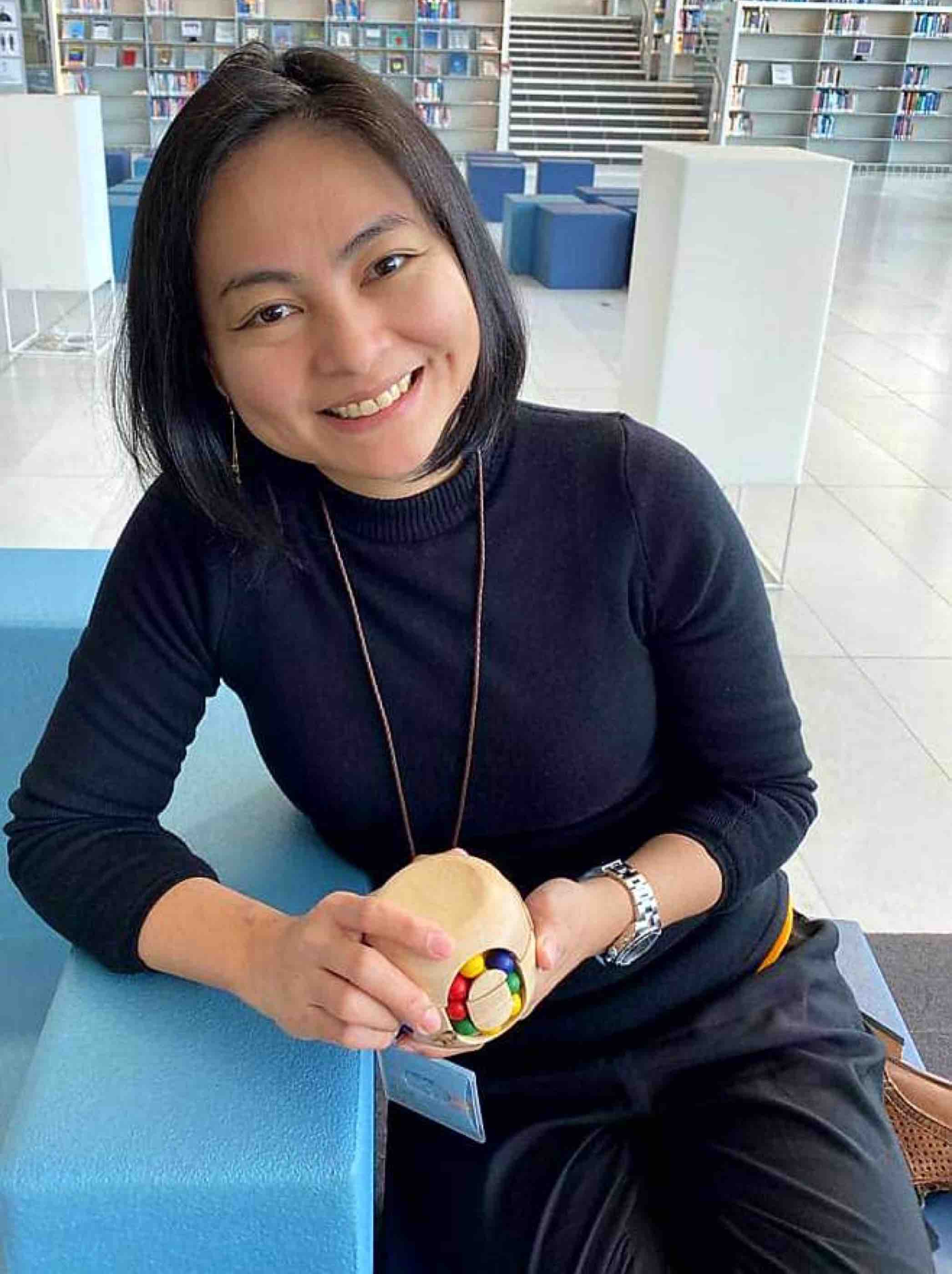 Christine T. Afinidad, Senior Information Services Librarian at Qatar National Library - qf - 02