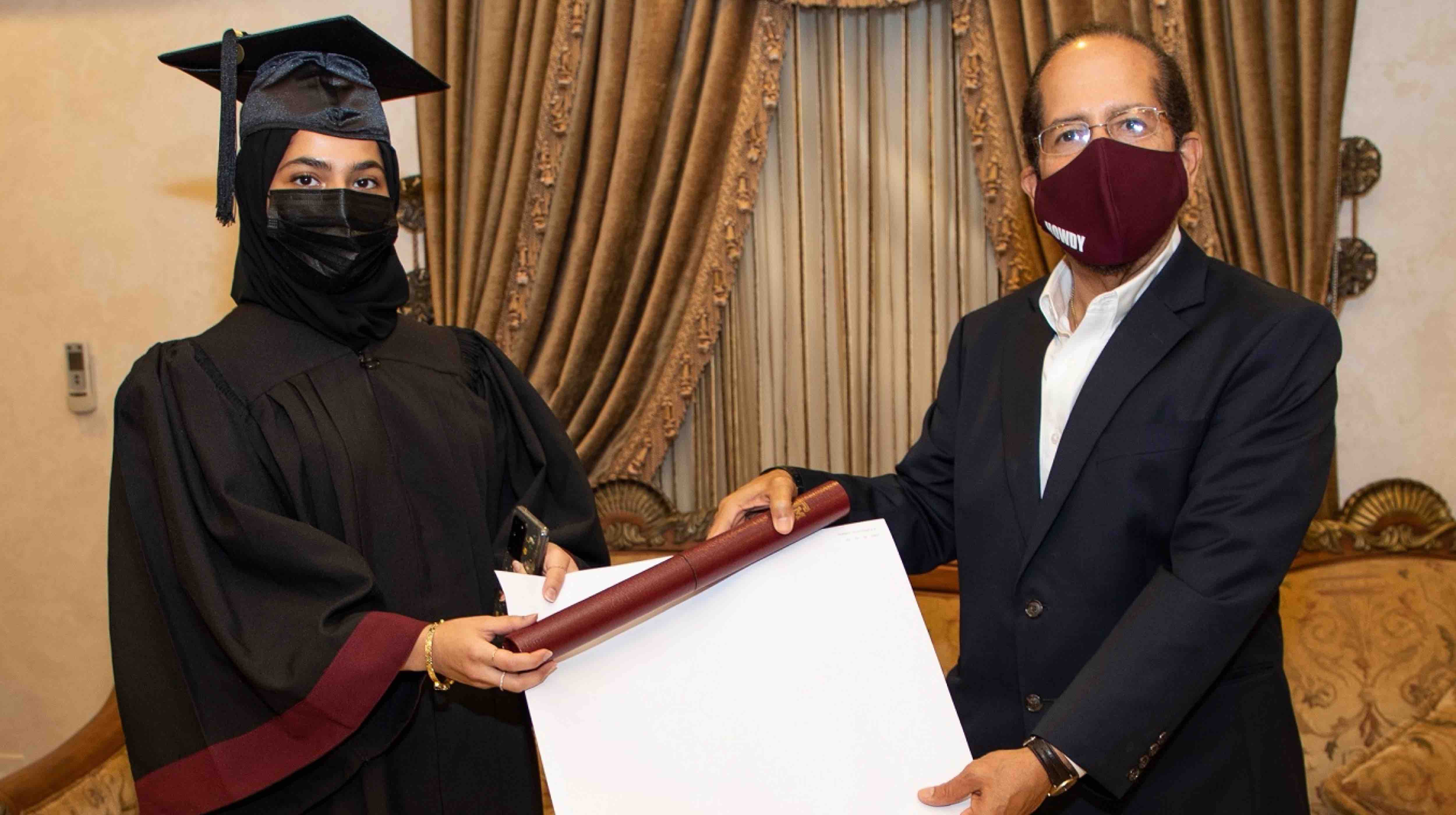 Dean of QF partner university presents degrees to 107 engineers – at their homes