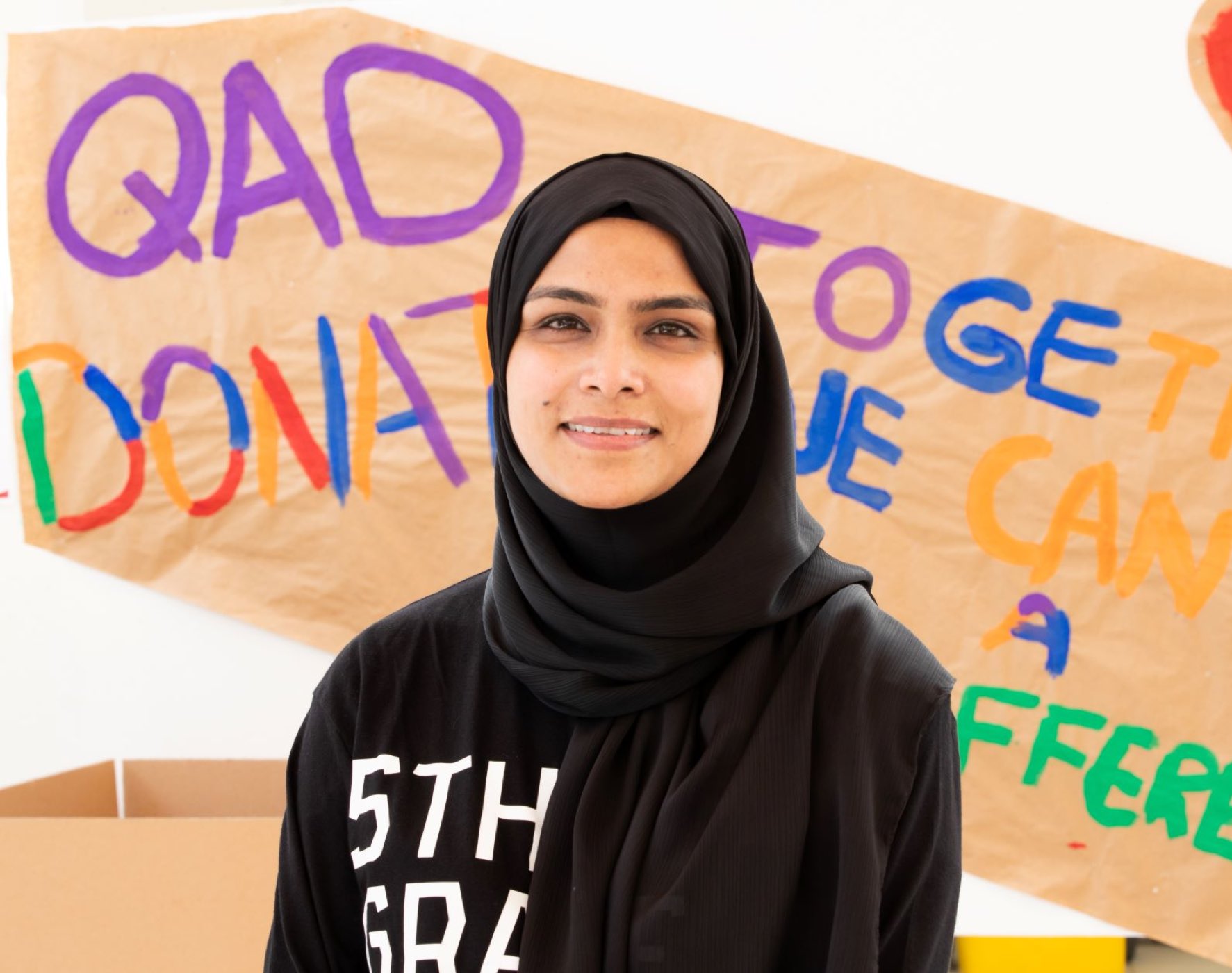 QF students share school supplies with Afghan refugees - QF - 09