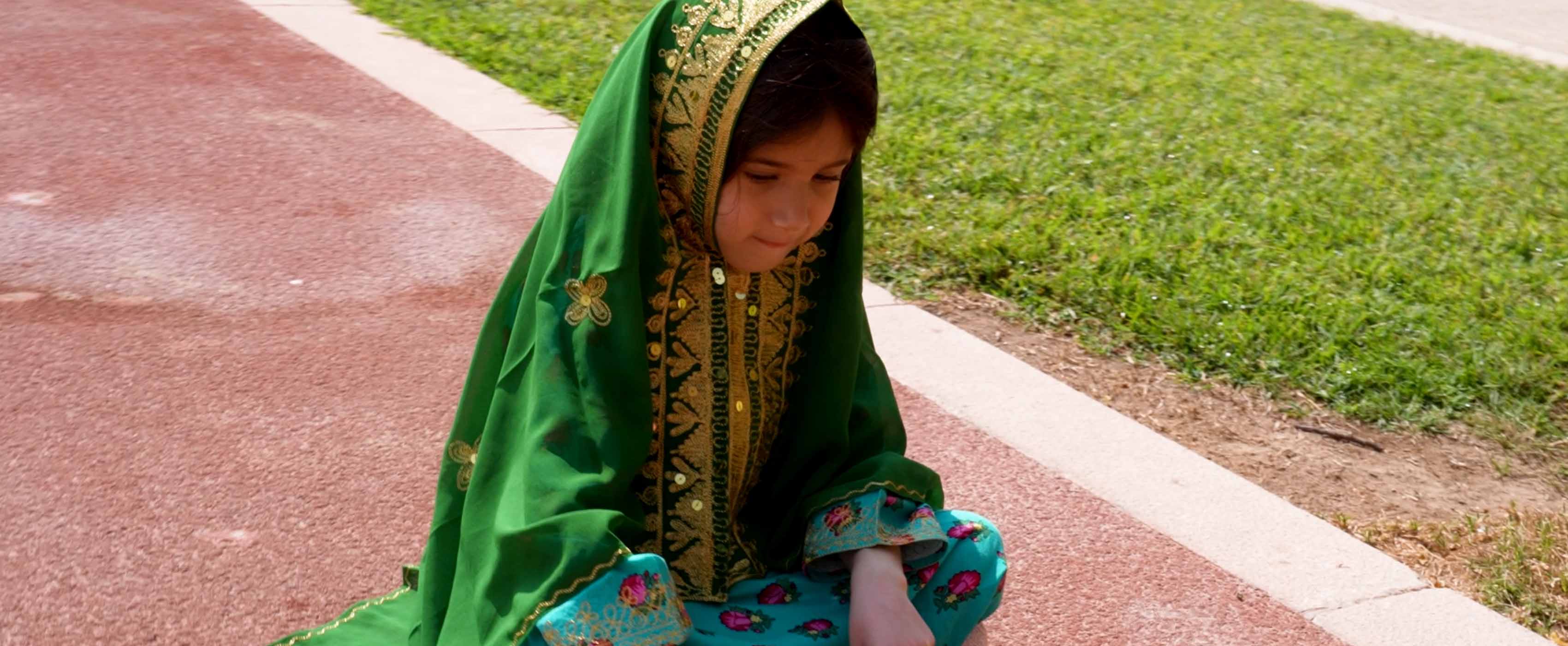 Academyati students teach visitors about local culture at Fan Experience