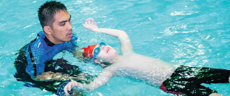 In his own words: QF’s Qader Award has enabled my son to challenge Autism through swimming
