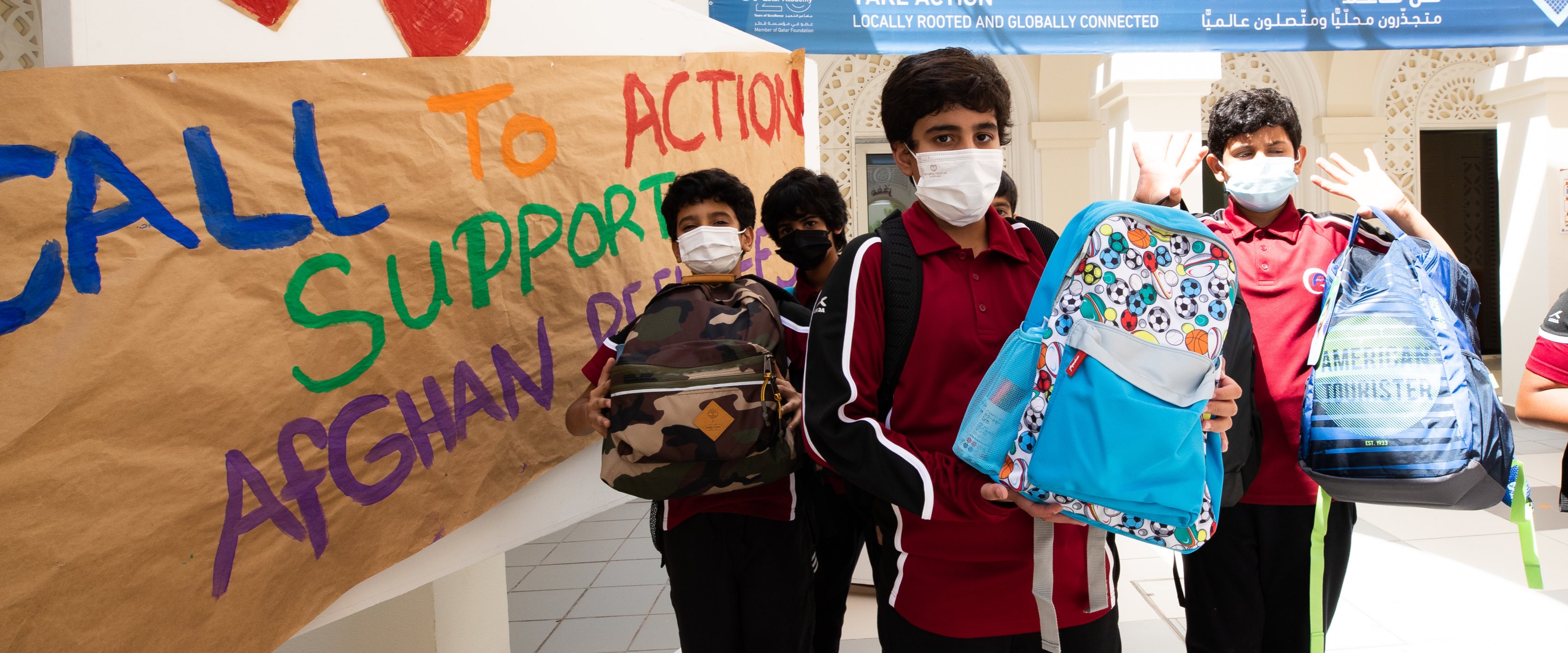 QF students share school supplies with Afghan refugees