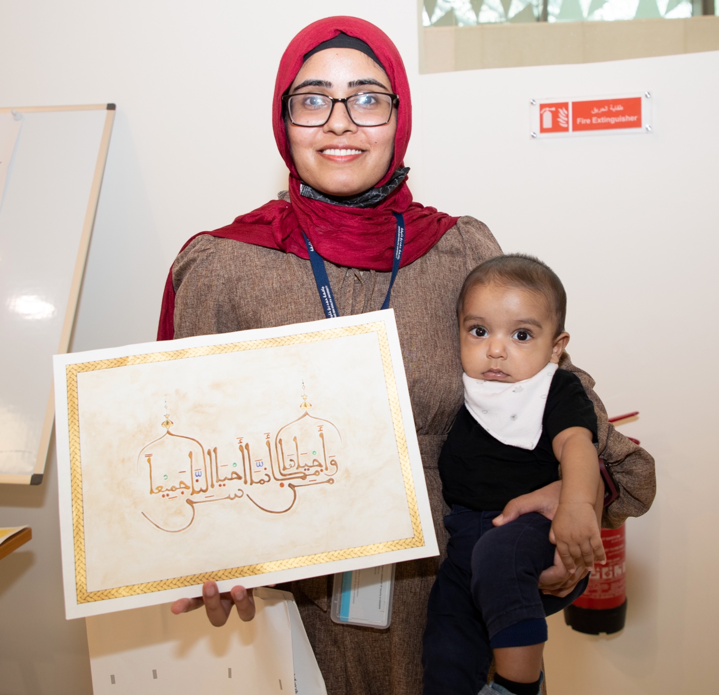 “I feel very connected with the calligraphy of Qur’anic scripture on the building,” says Education City Mosque calligraphy competitor - QF - 05
