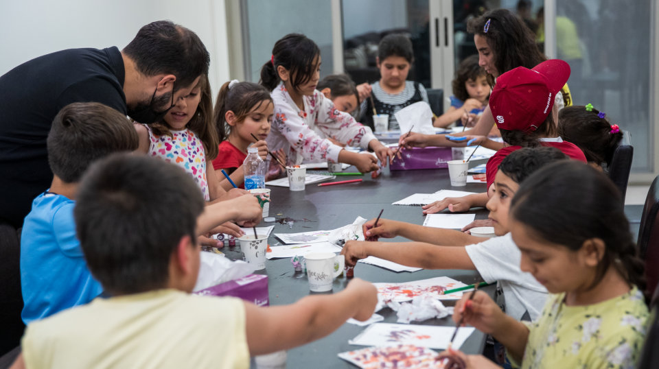 QF volunteers support Afghan refugees in Qatar 