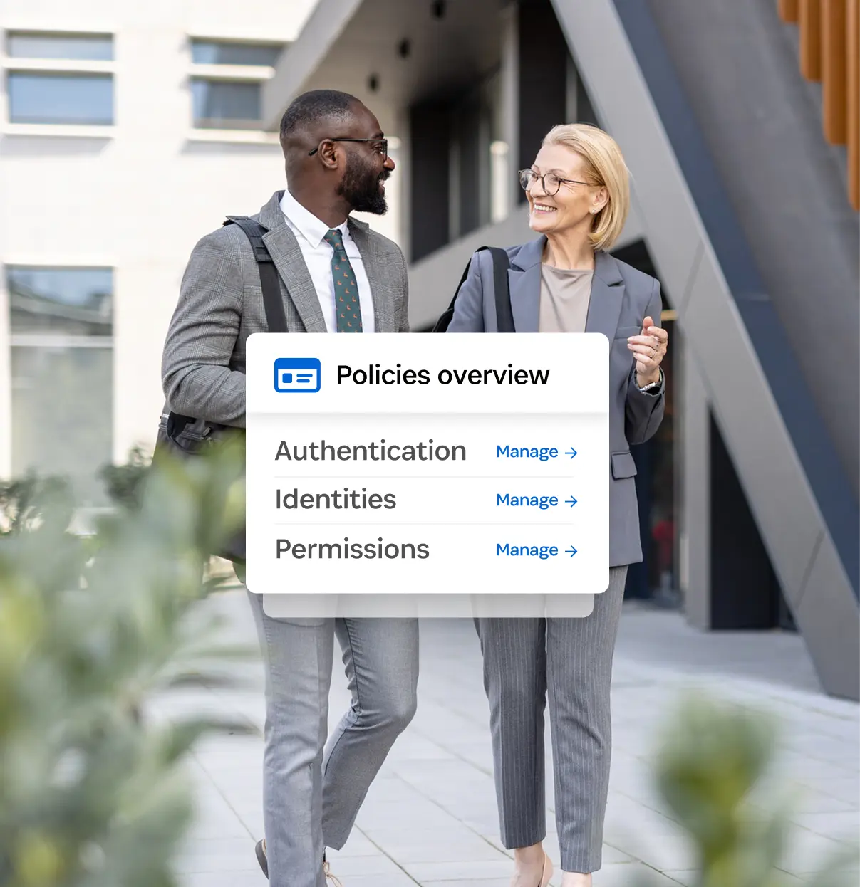 A business man and a business woman conversing about access management. 