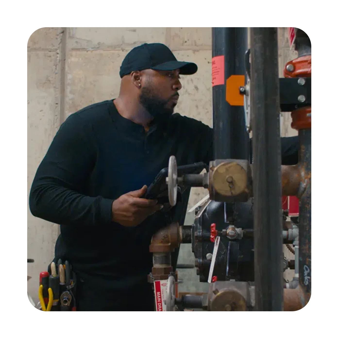 ServiceTrade customer in an industrial setting, highlighting the real-world ROI of using 1Password for AI spend tracking.