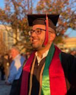 Salman at his graduation, in graduation cloak and hat