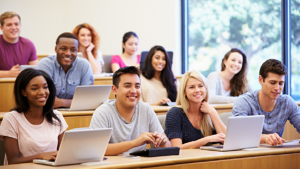 A group of international students sit in a graduate course for their master's degree program at a US university.