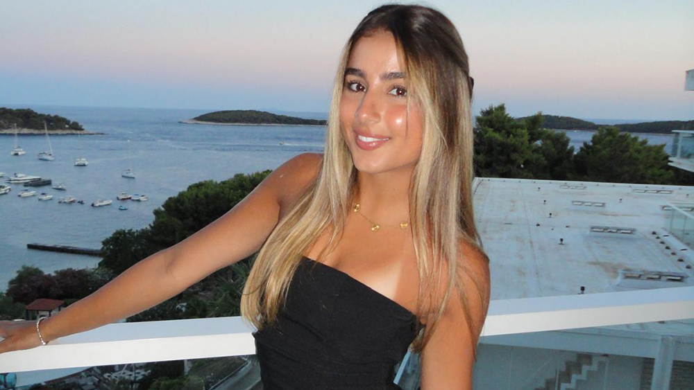 Julia, an international student from Brazil and student ambassador for the International Accelerator Program at the University of South Carolina, smiles for the camera.