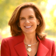 Lauren Stone, managing director of the International Accelerator Program at the University of South Carolina, stands outdoors and smiles for the camera