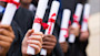 What is bachelor degree? A bachelor degree means you've earned a four-year university certification. After deciding between a ba vs bs, and understanding what is a bs degree, six international student graduates who earned a ba degree or a bs degree stand in a row and hold their rolled up diplomas tied with red ribbon. Get a list of bachelor degrees at international friendly universities from a Shorelight advisor. 