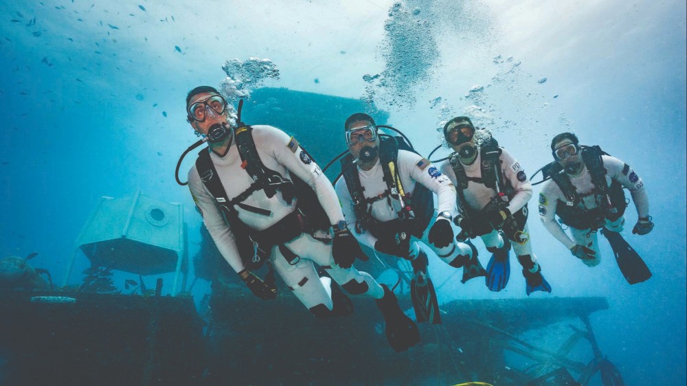 Three aquanauts study under the sea with the FIU Medina Aquarius program
