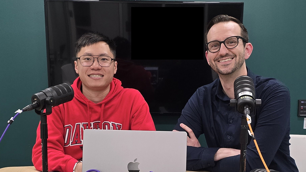 Zhe-Yu, an international student from Taiwan at the University of Dayton, sits next to UDayton Global advisor Nate Prior during a podcast recording.