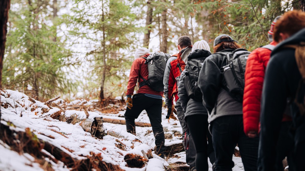 A group of hikers walk up a mountain at Gonzaga University in Spokane, Washington