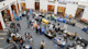 A view from above of tables and booths at a career fair for international students at the University of Wyoming