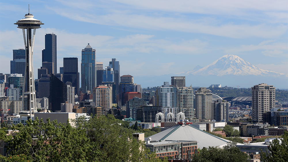 The Space Needle and Mount Rainier loom over the Seattle city skyline. Seattle University is now accepting international student applications via Shorelight.