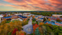 This photo shows an aerial view of Stony Brook University in New York state under a colorful sunset.