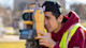 University of South Carolina international student Shilpkumar from India looks through a surveyor lens at his civil engineering job