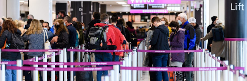 Passengers at check-in - hero