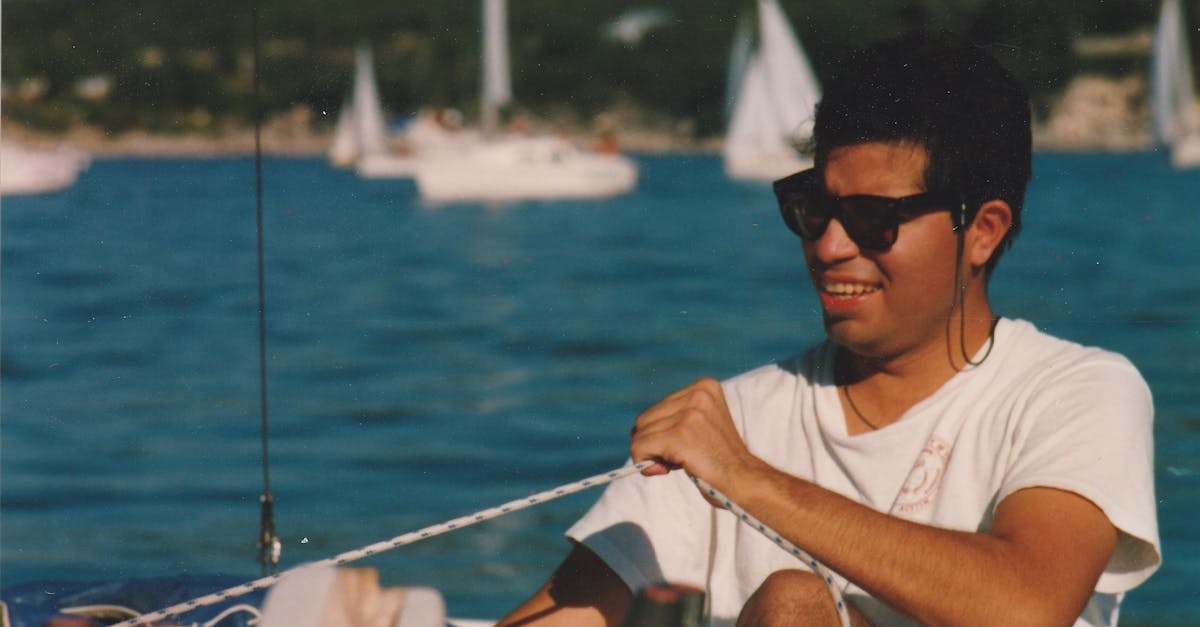 A Man in White Shirt Wearing a Sunglasses