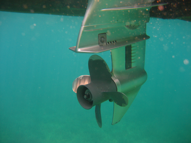 Motorboat propeller under water