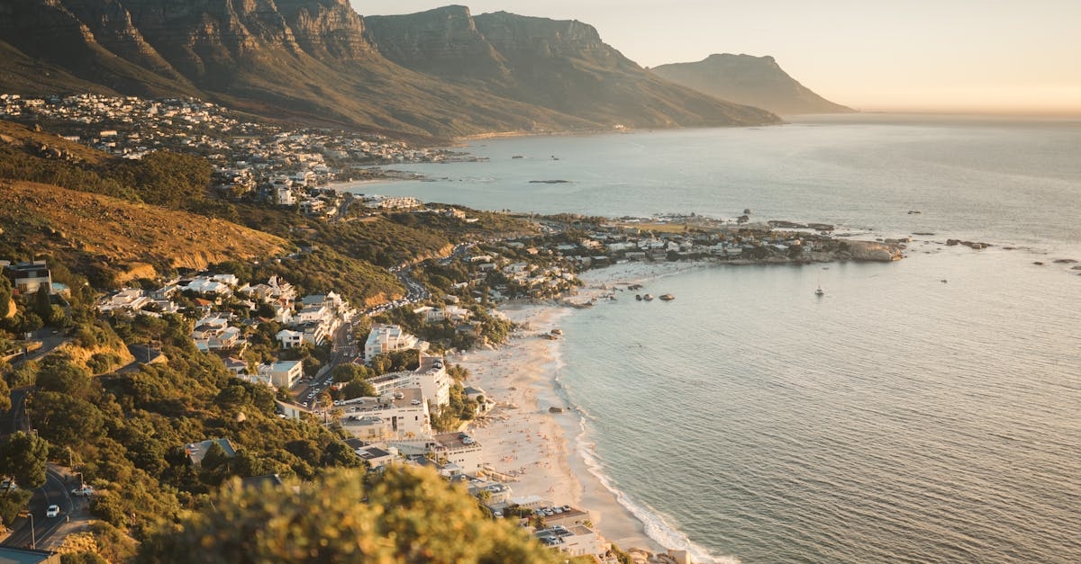 Aerial View of Buildings on Mountain Near Body of Water