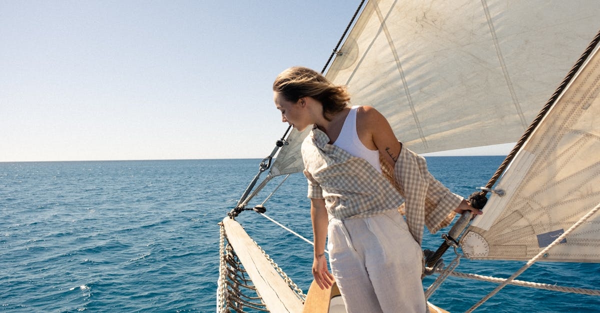 Woman Standing at a Sailboat