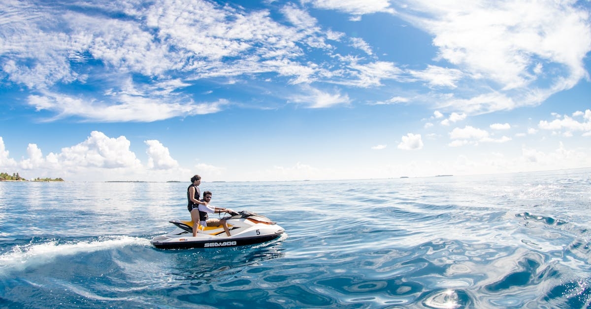 Two People Riding On Jet Ski