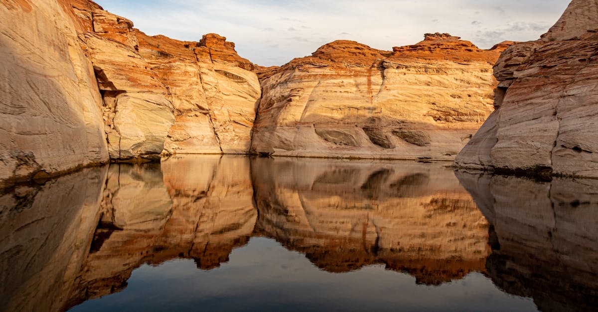 Brown Rock Formation Near Body of Water