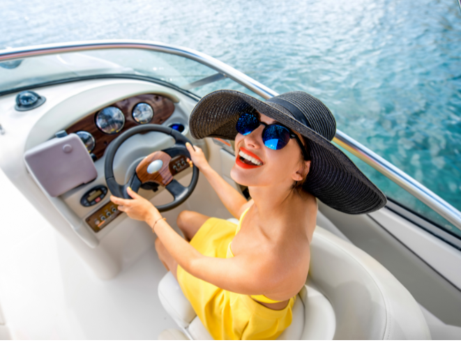 Woman driving a yacht