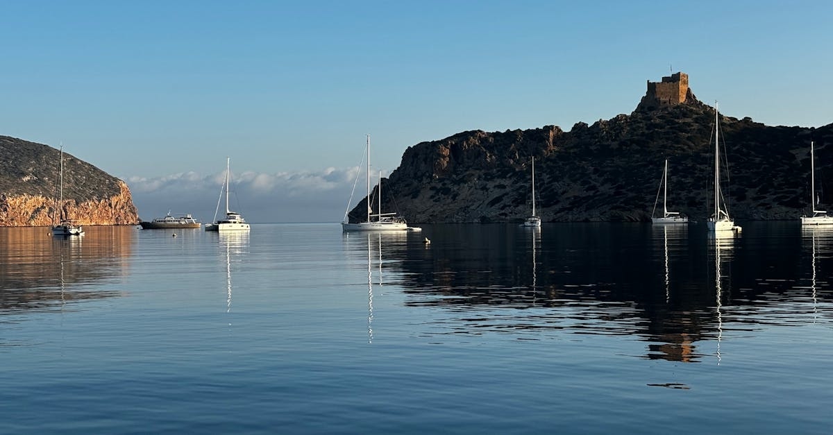 Serene Mediterranean Seascape with Sailboats