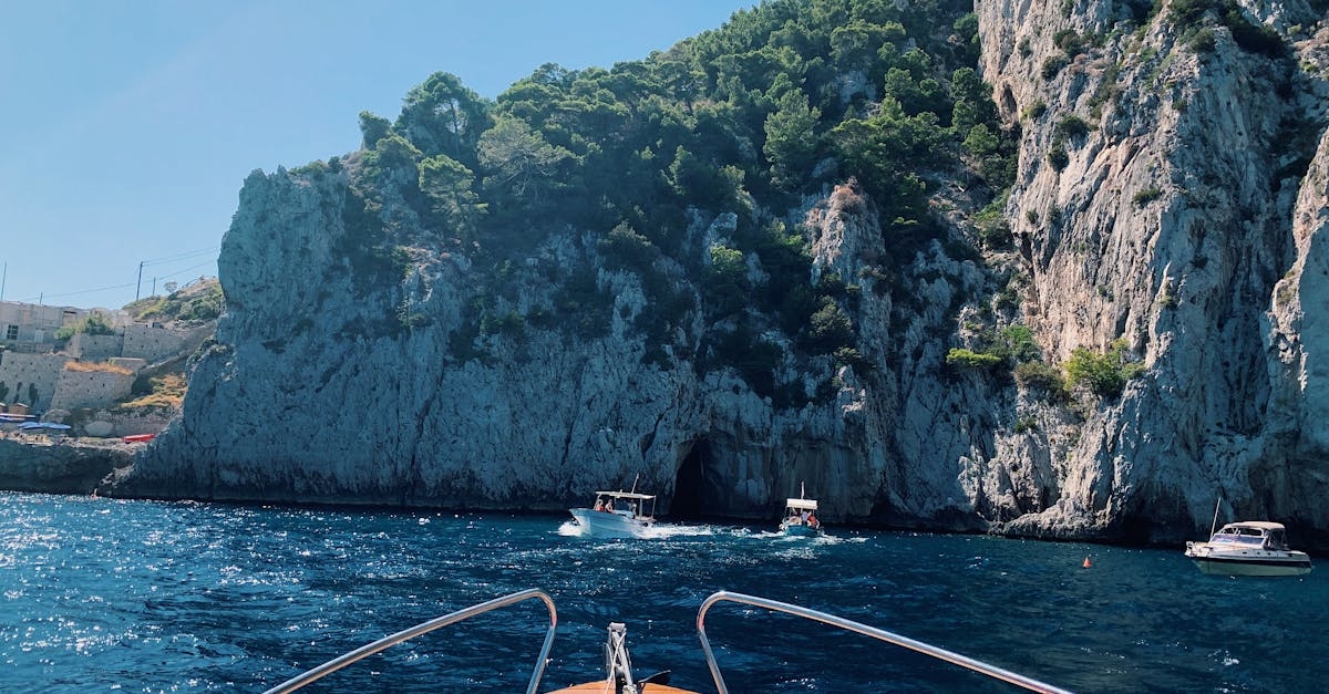 Powerboat in Ocean Near Mountain