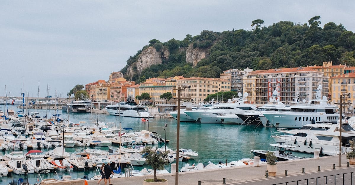 A White Yacht Docked on the Port