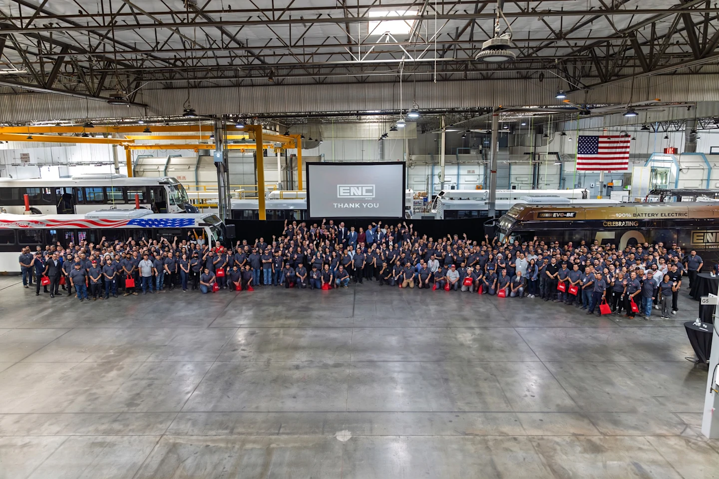 The ENC team gathered on the Riverside factory floor