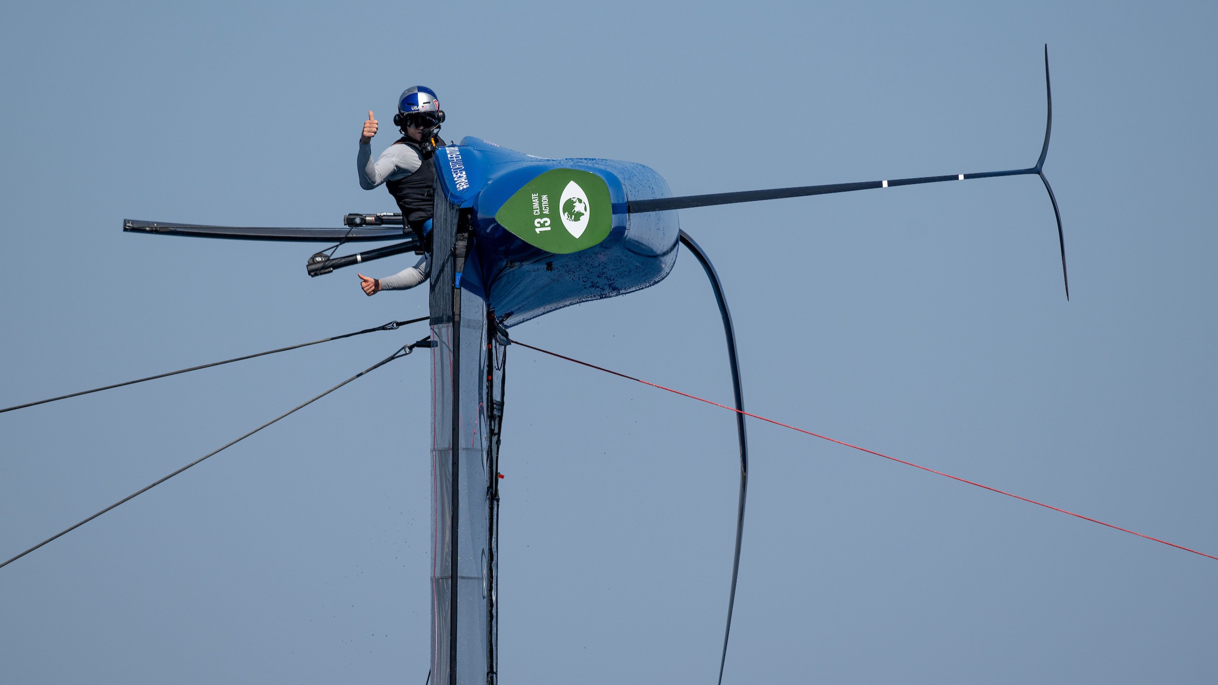 Season 4 // Spithill gives a thumbs up from capsized USA F50