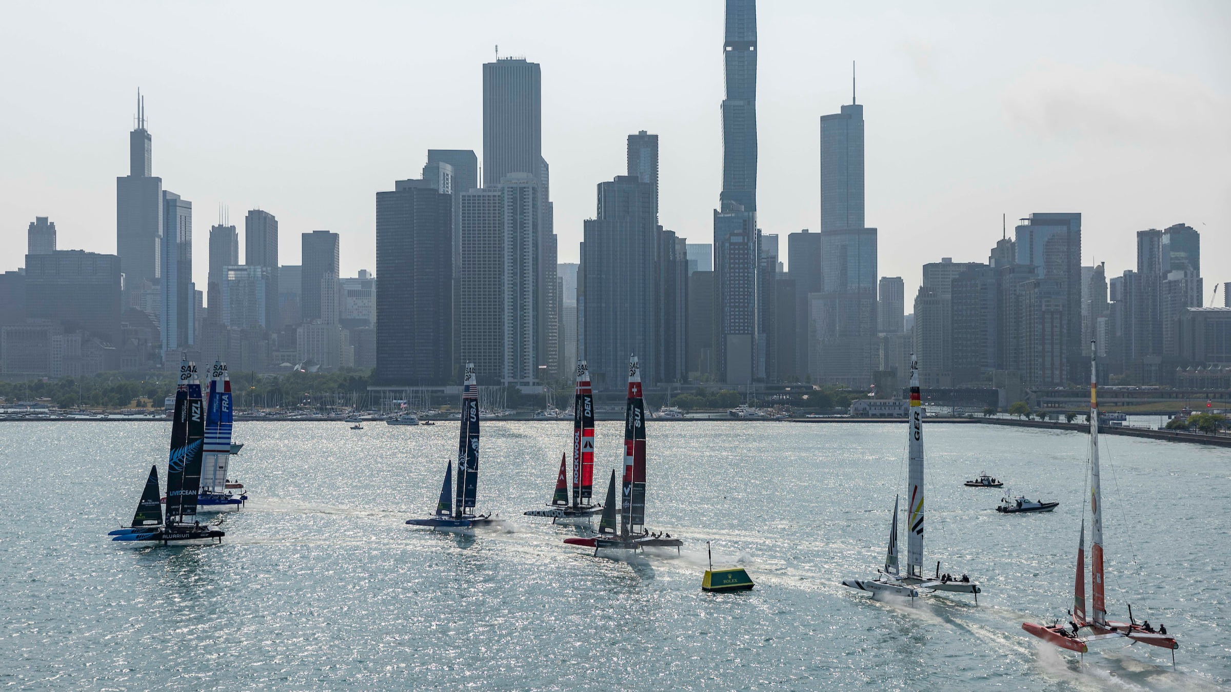 Season 4 // Switzerland SailGP Team // Switzerland in the fleet with city skyline