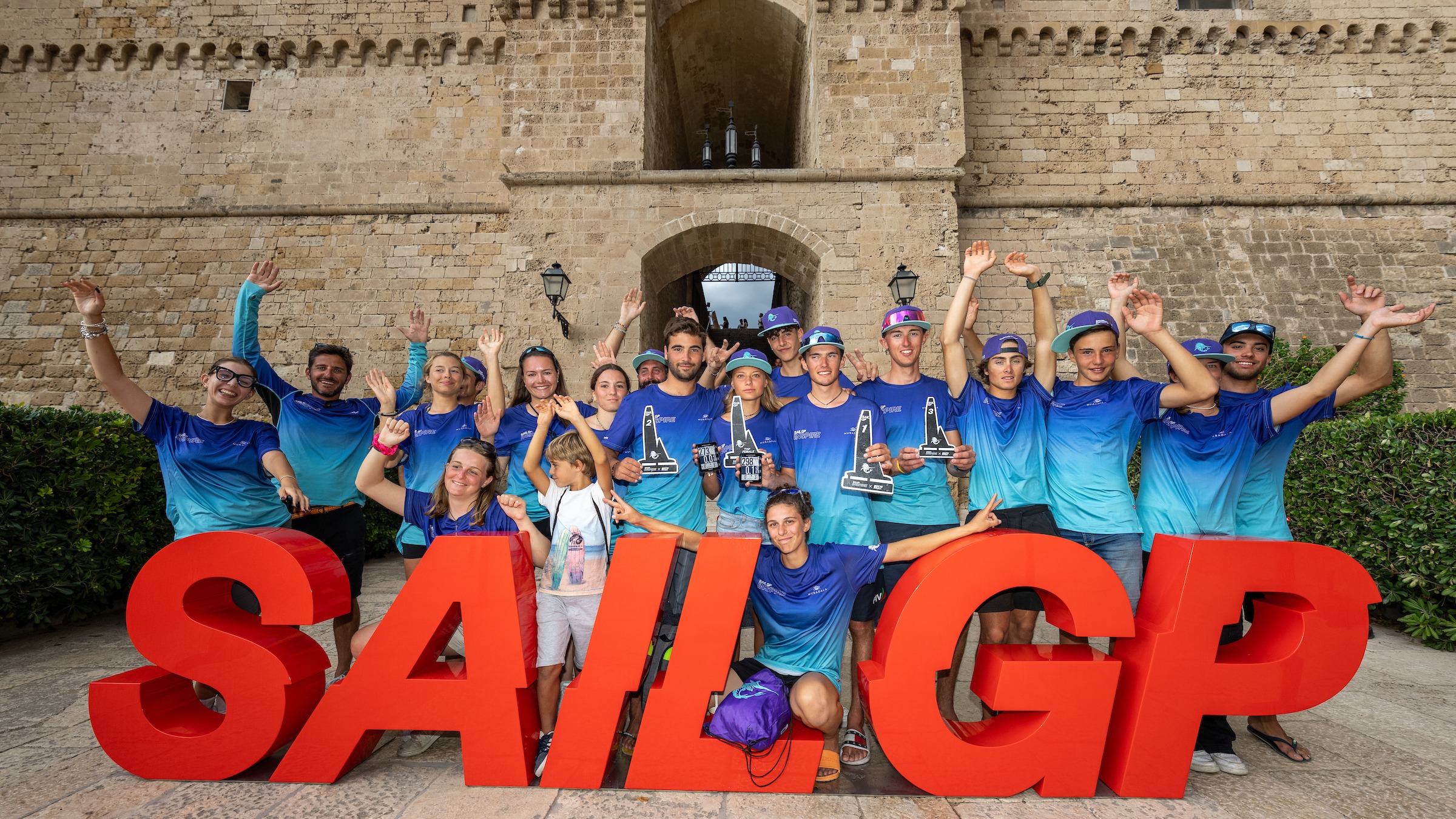Season 4 // WASZP Inspire candidates celebrating in Taranto after Italy SailGP