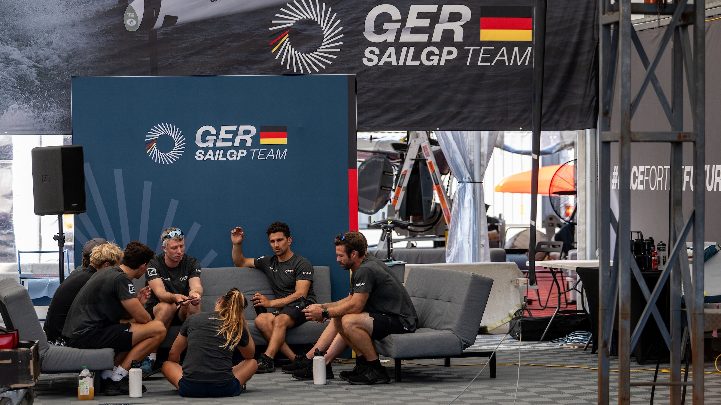 Season 4 // German team sit in their team base at the Saint Tropez tech base 