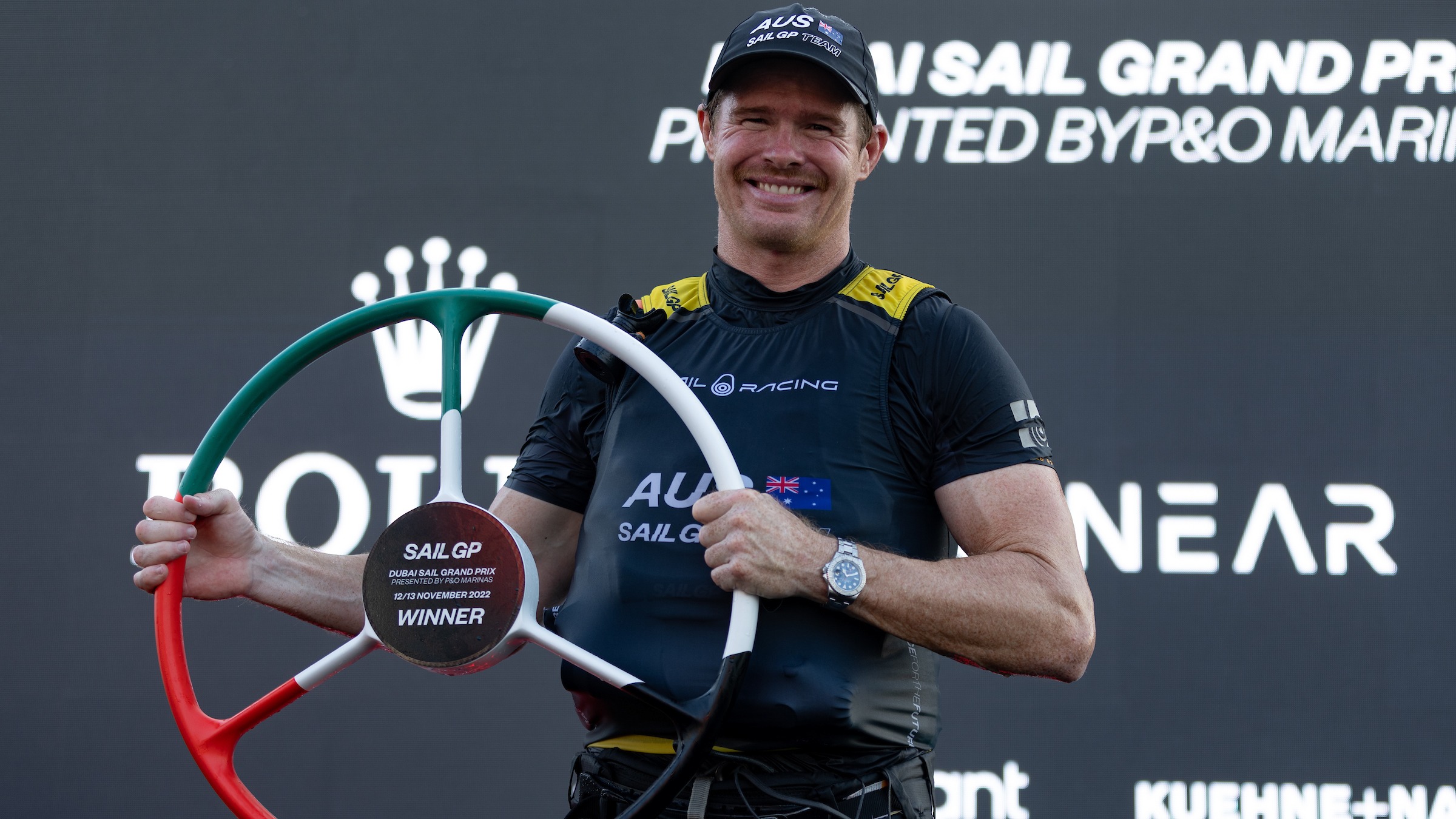 Season 3 // Dubai Sail Grand Prix // Tom Slingsby holds Dubai trophy