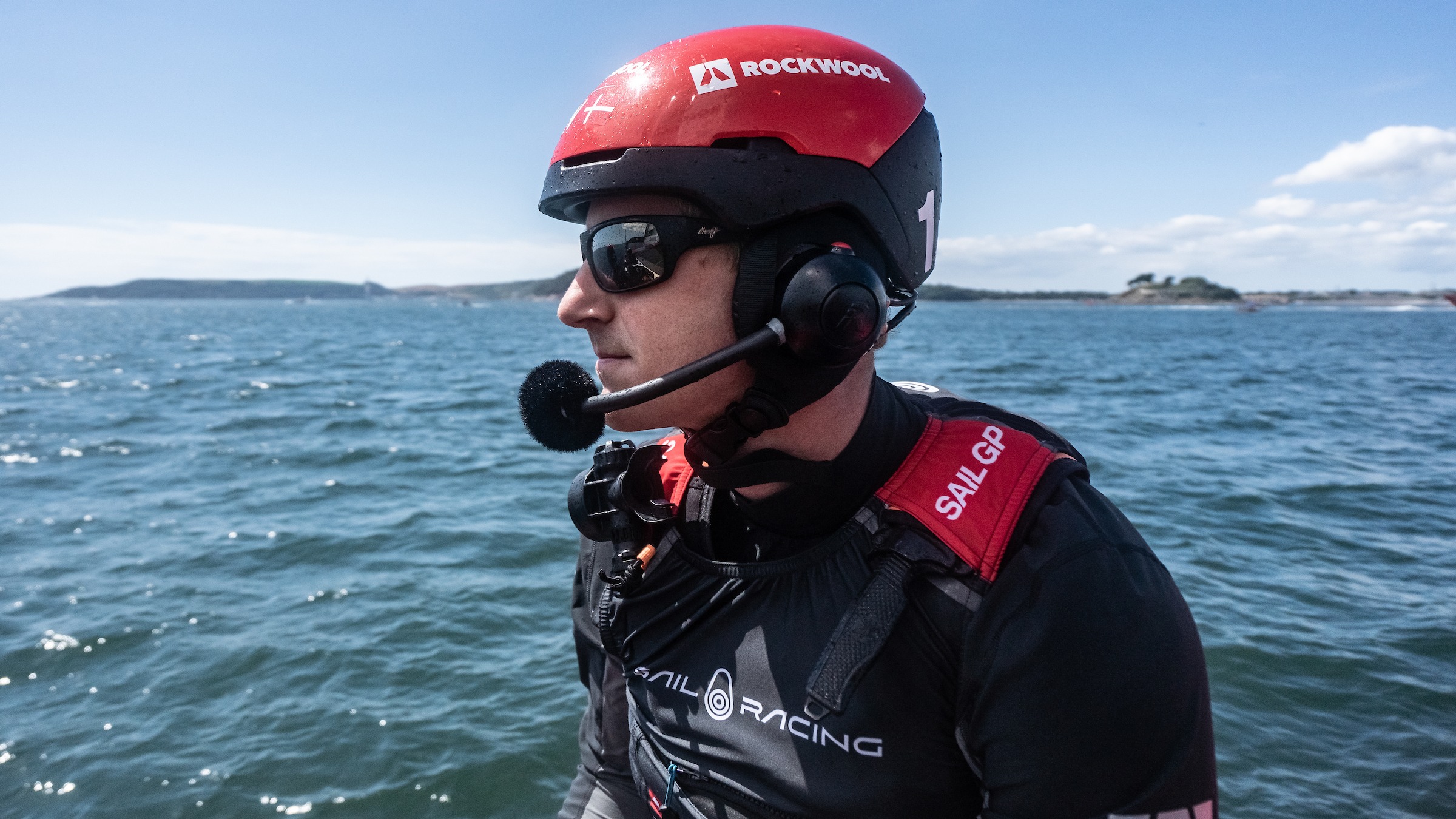 Season 3 // Denmark SailGP Team // Nicolai Sehested at the wheel 